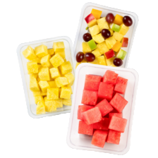 Ananas, mango of watermeloen blokjes of fruitsalade ananas/druif